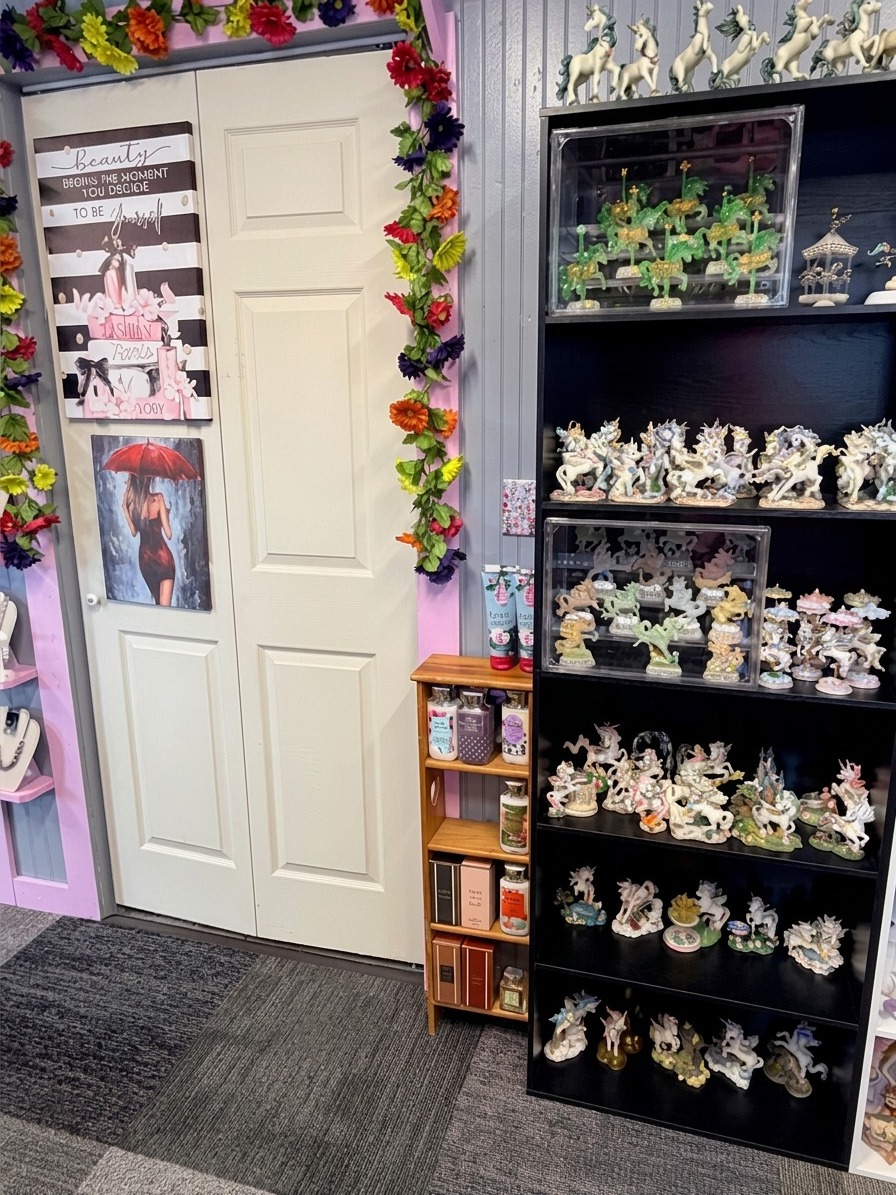 Wall art and unicorn figurine collection