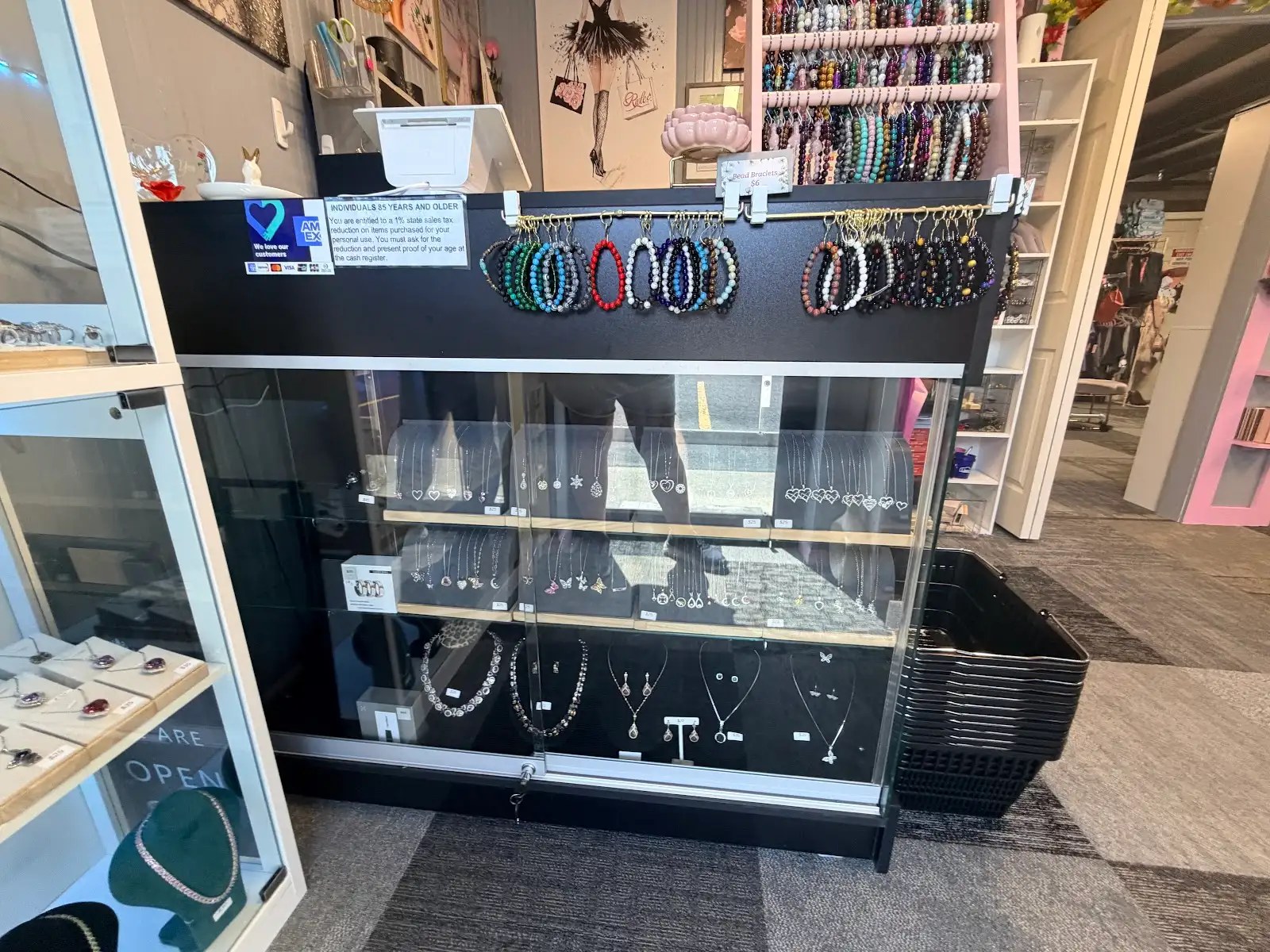 Bead bracelets and silver jewelry display