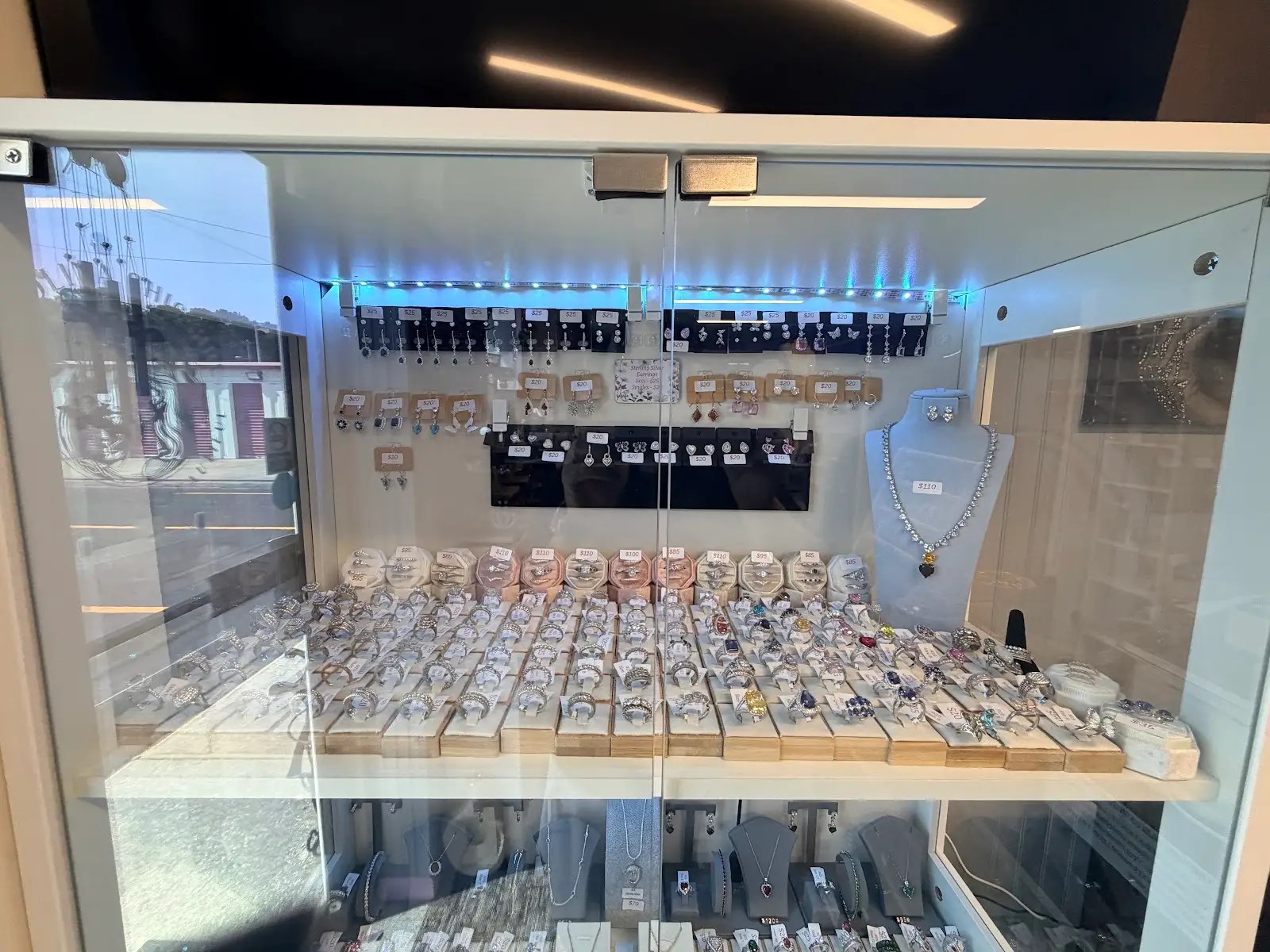 Sterling silver rings and earrings display