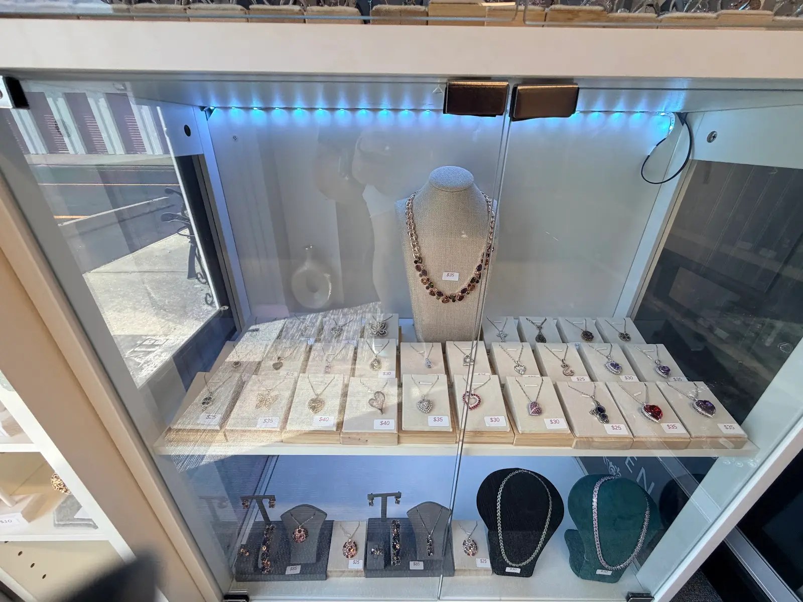 Curated pendant necklace display