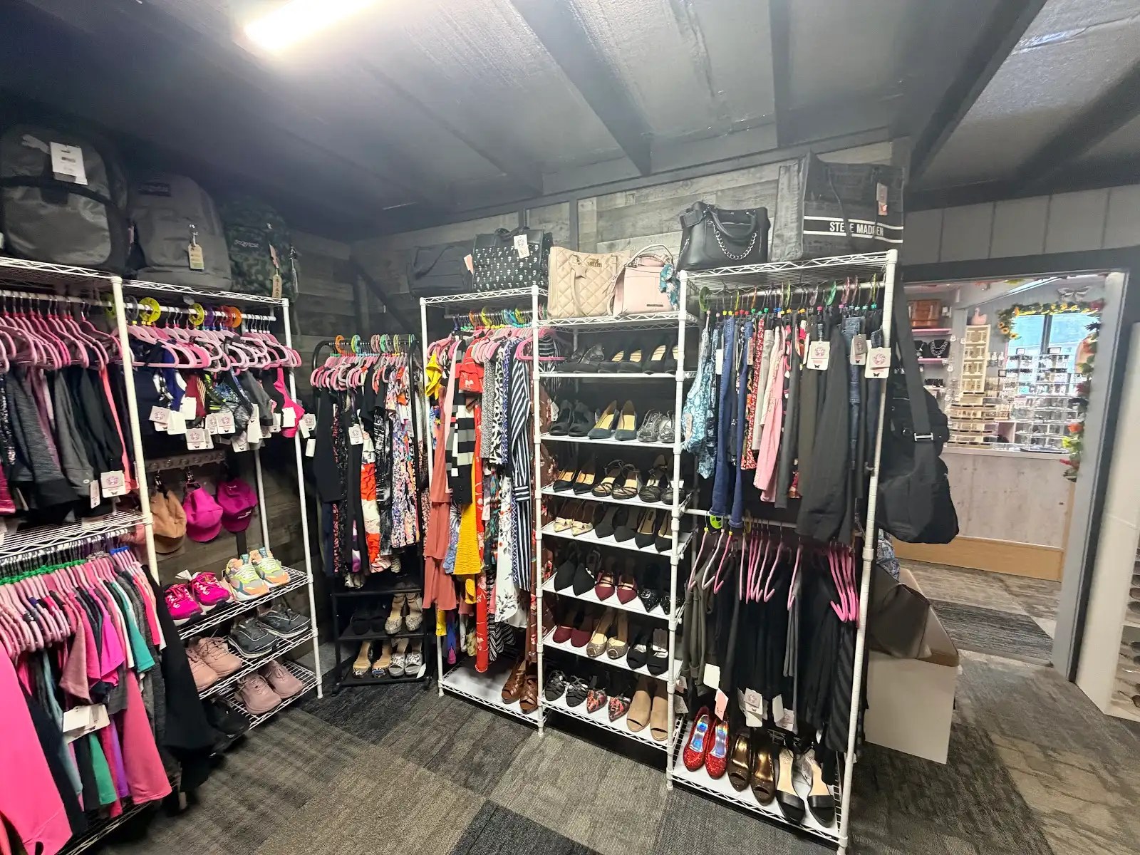 Tops, dresses, handbags and shoes display