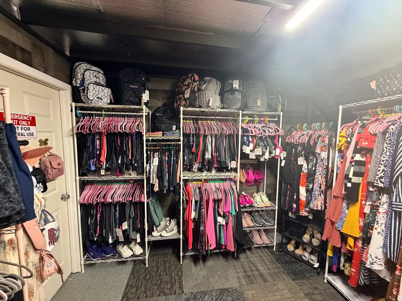 Activewear, dresses and sneakers on the racks