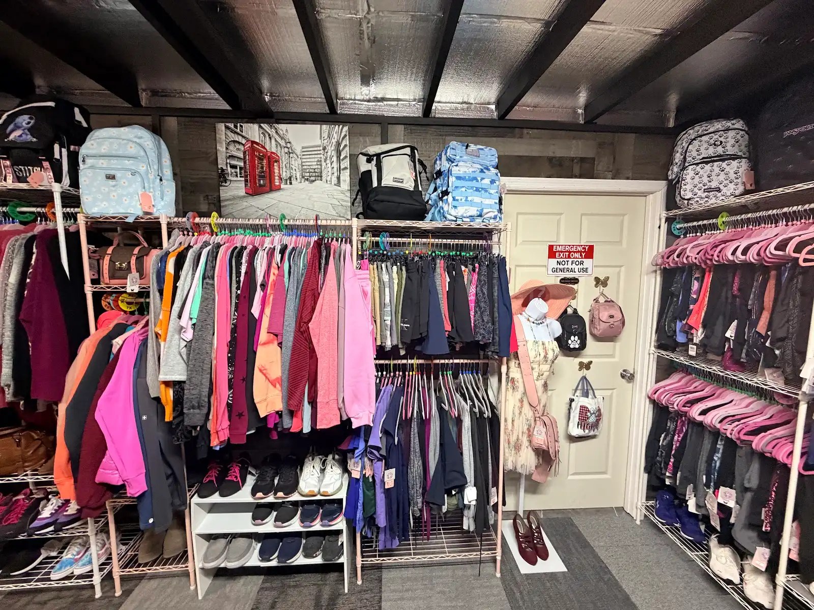 Tops, shoes and backpacks on display