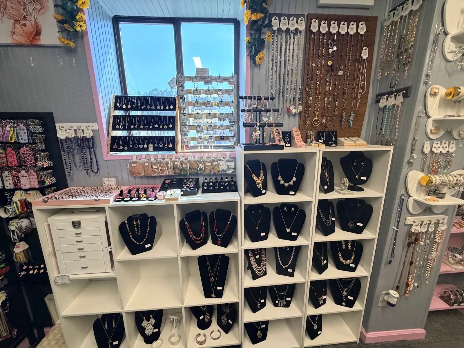 Curated necklace cubbies and key chains